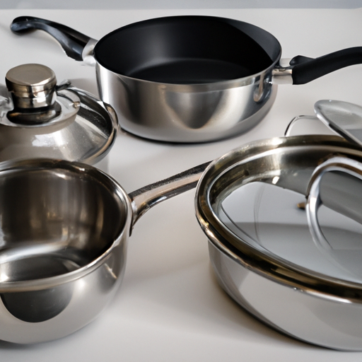 A variety of cookware including stainless steel pots, non-stick pans, and cast iron skillet.